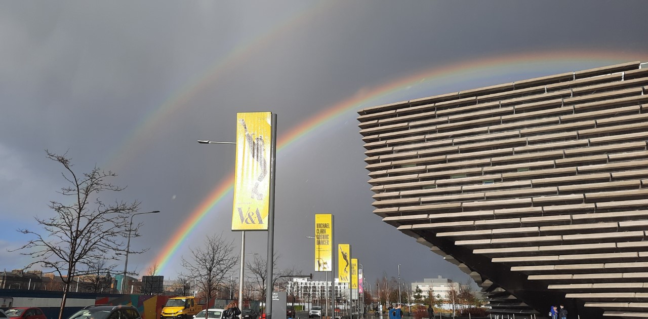 The Victoria and Albert Design museum in Dundee with a double rainbow